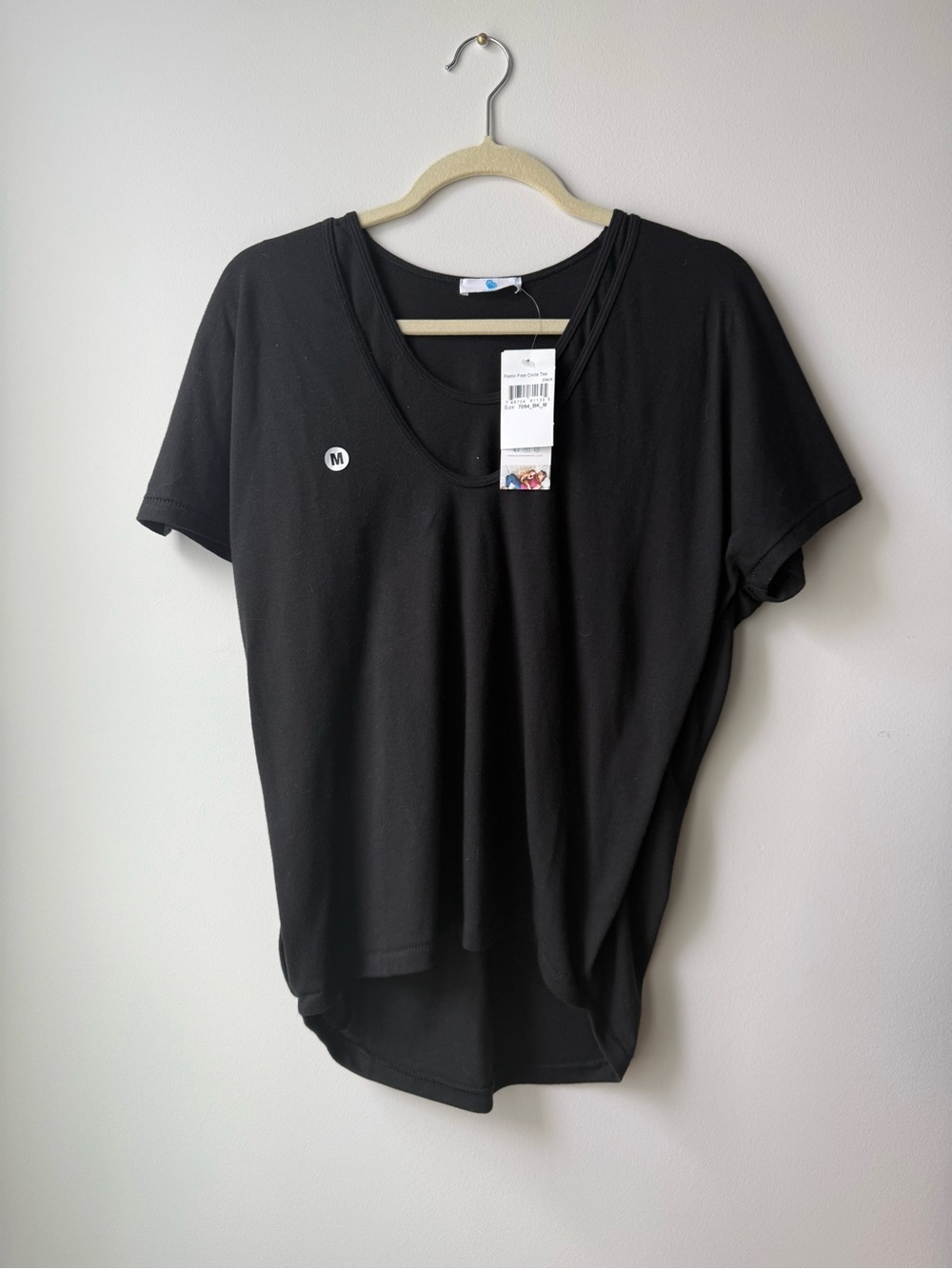 Never worn breastfeeding friendly top. Black cotton t-shirt